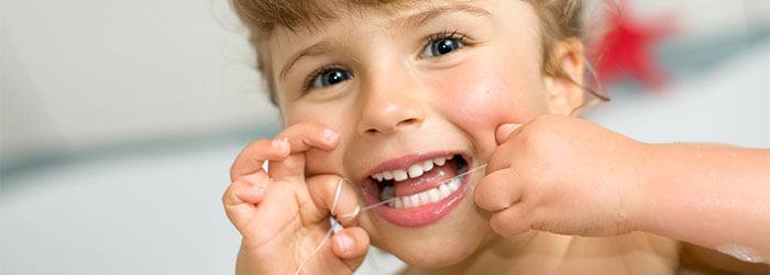Kids dental care Flossing
